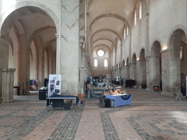 The halls of Kloster Eberbach with exhibition stands but no people around because the doors just open in a minute